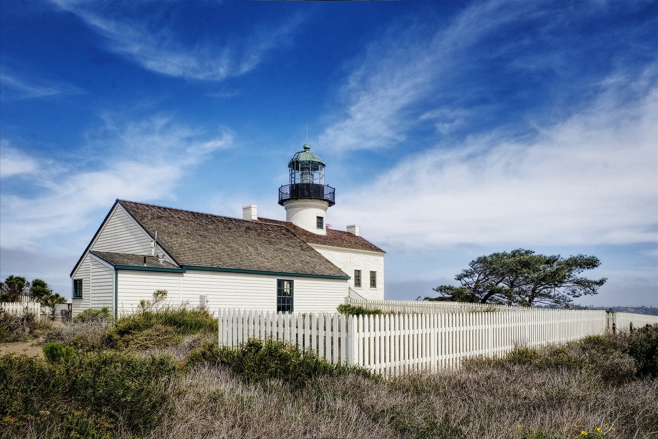 old point loma lighthouse, lighthouse, building, structure, historic, historical, landmark, fence, grass, sunny, nature, san diego, california